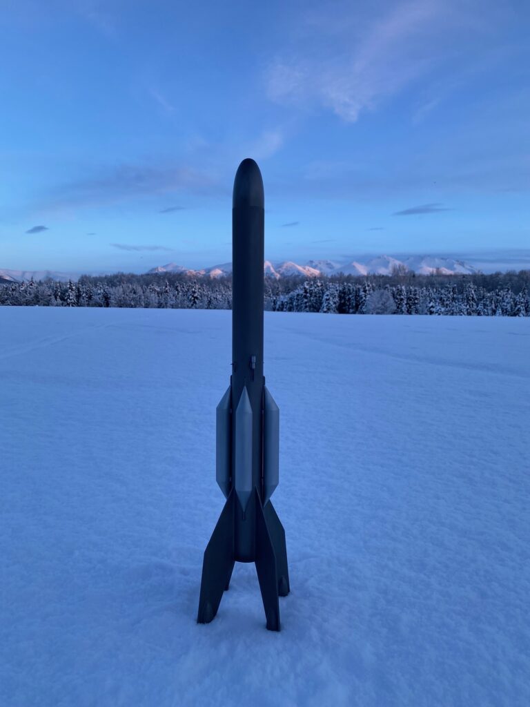 Super Big Bertha in snowy field.