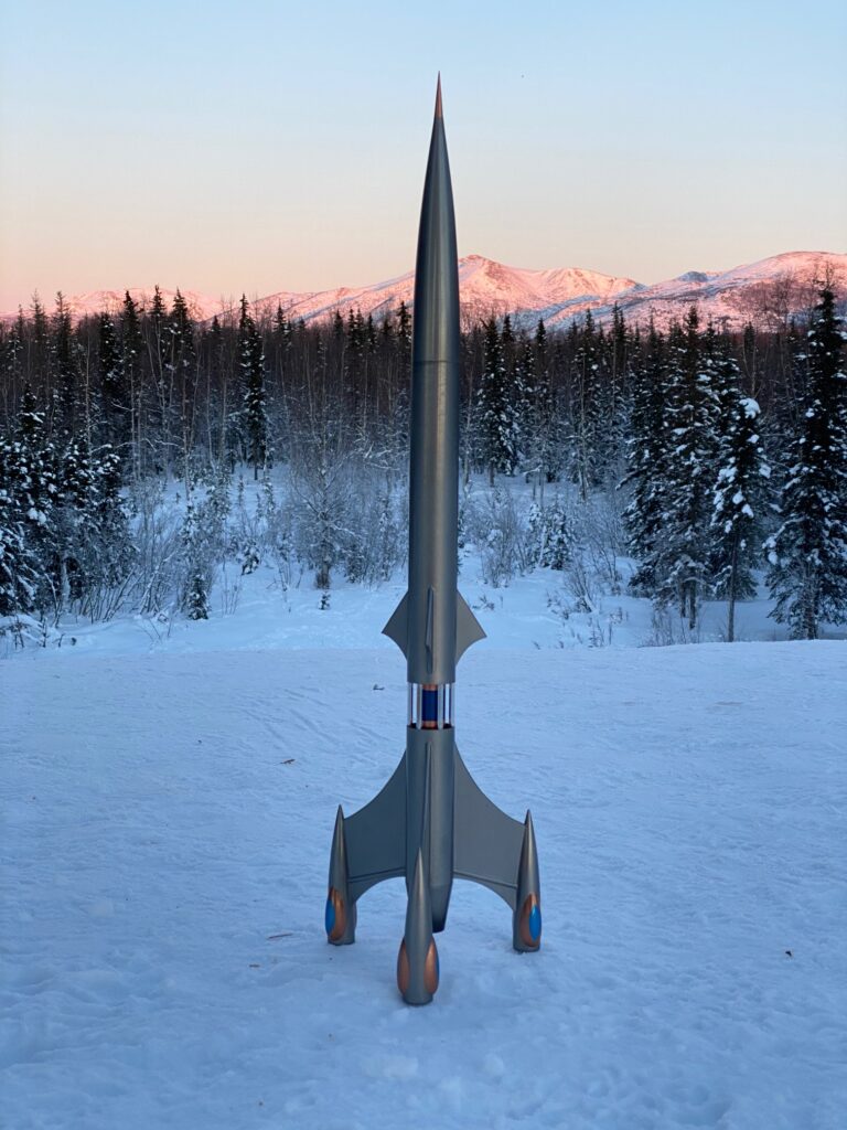 Protostar model rocket with alpenglow