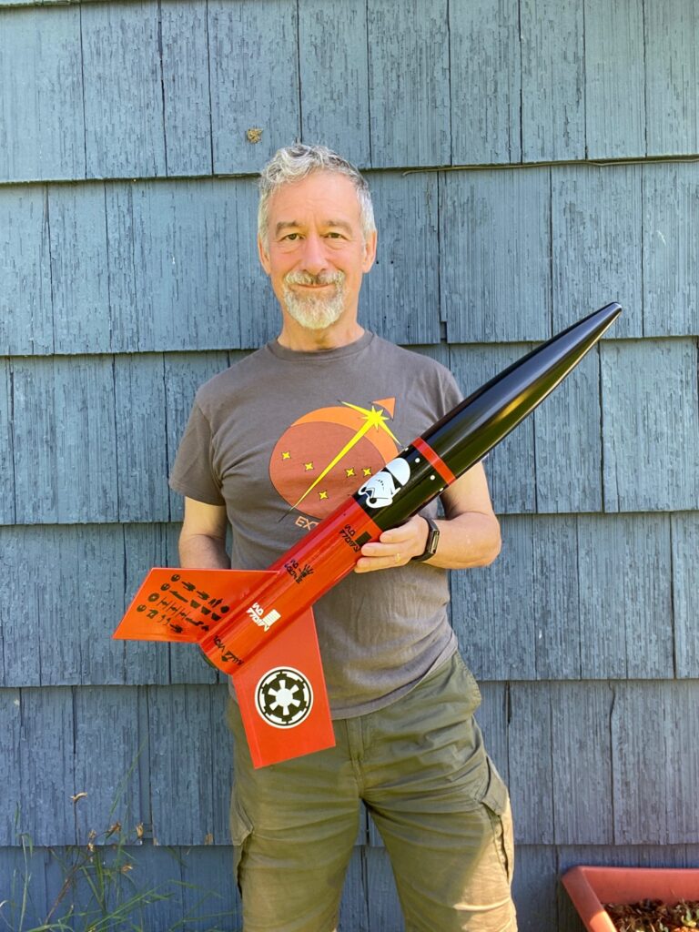 Franklin holding mid-power rocket